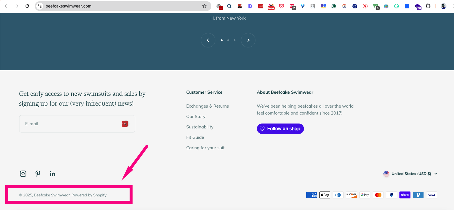example of powered by shopify usage on footer on beefcake swimwear. 